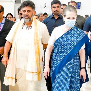 What gift has Sonia promised to DK? 