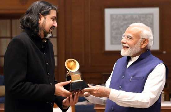 Modi takes the glam route, ties up with Grammy award winning singer 