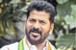 What does Revanth Reddy's survey predict?